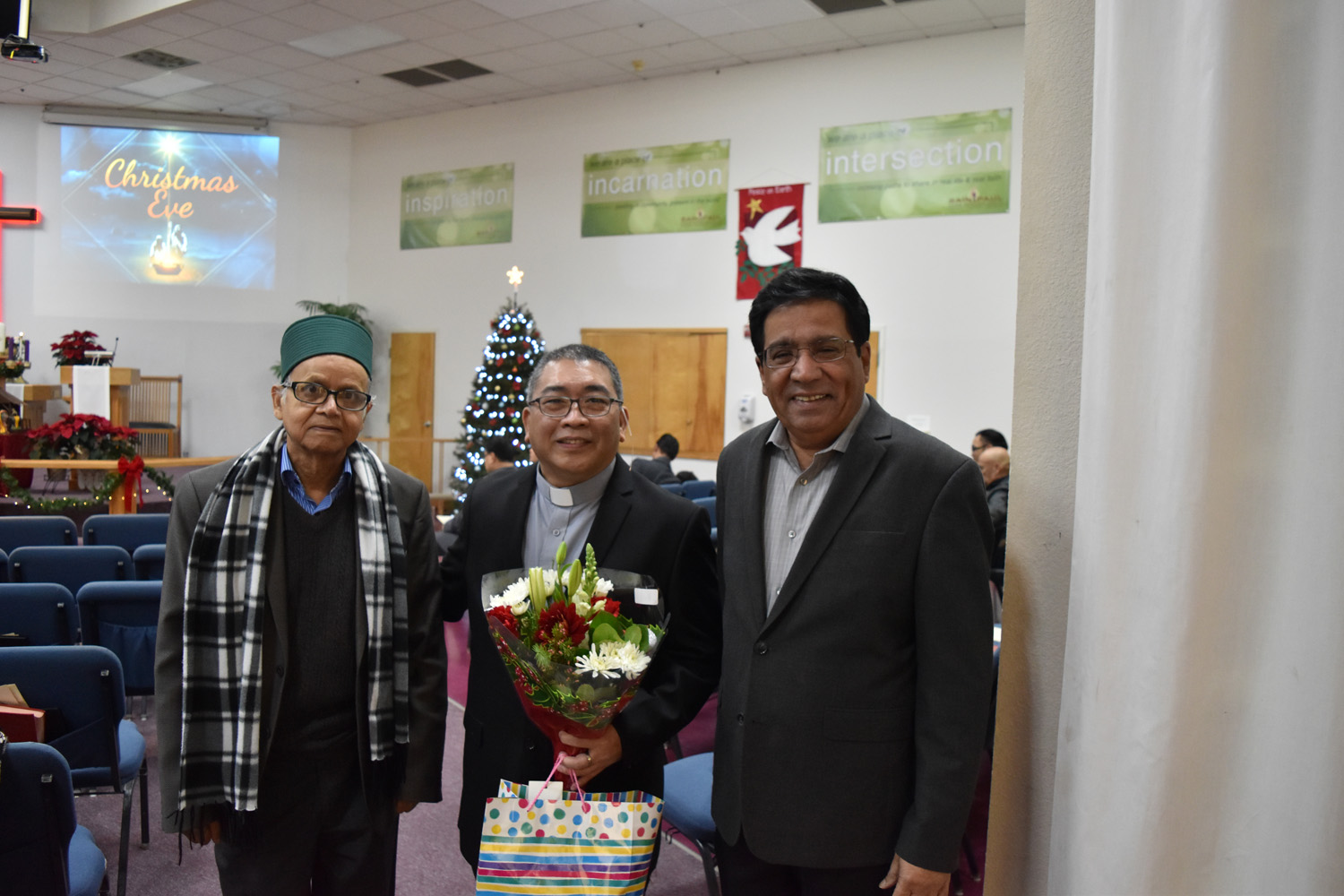 Abdus Sattar Ghazali and Jamal Qureshi with the pastor of the St. Paul Methodist Church