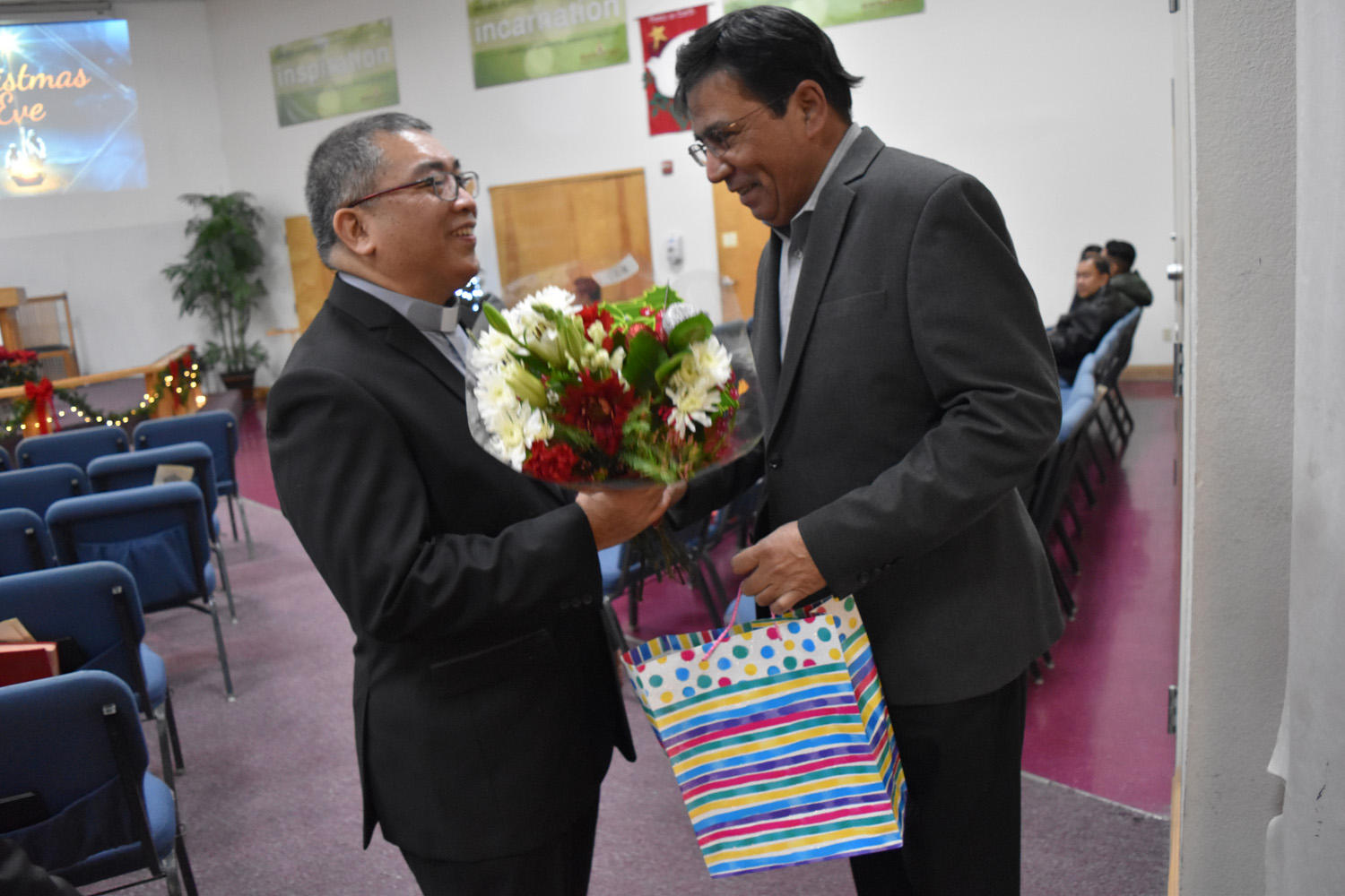 ISEB President Jamal Qureshi offers Christmas congratulations to the Pastor of the neighboring St. Paul Methodist Church.